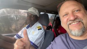 Driver with our client on Kenya safari
